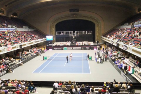The crowd and the tennis players prepare for the first match of the Fed Cup on Feb. 8, 2014. 