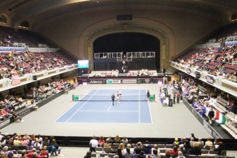 The crowd and the tennis players prepare for the first match of the Fed Cup on Feb. 8, 2014.