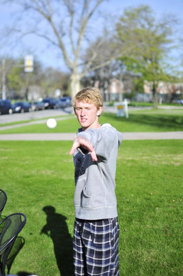 Senior Jacob Herbst throws the ping pong ball May 5, 2014.